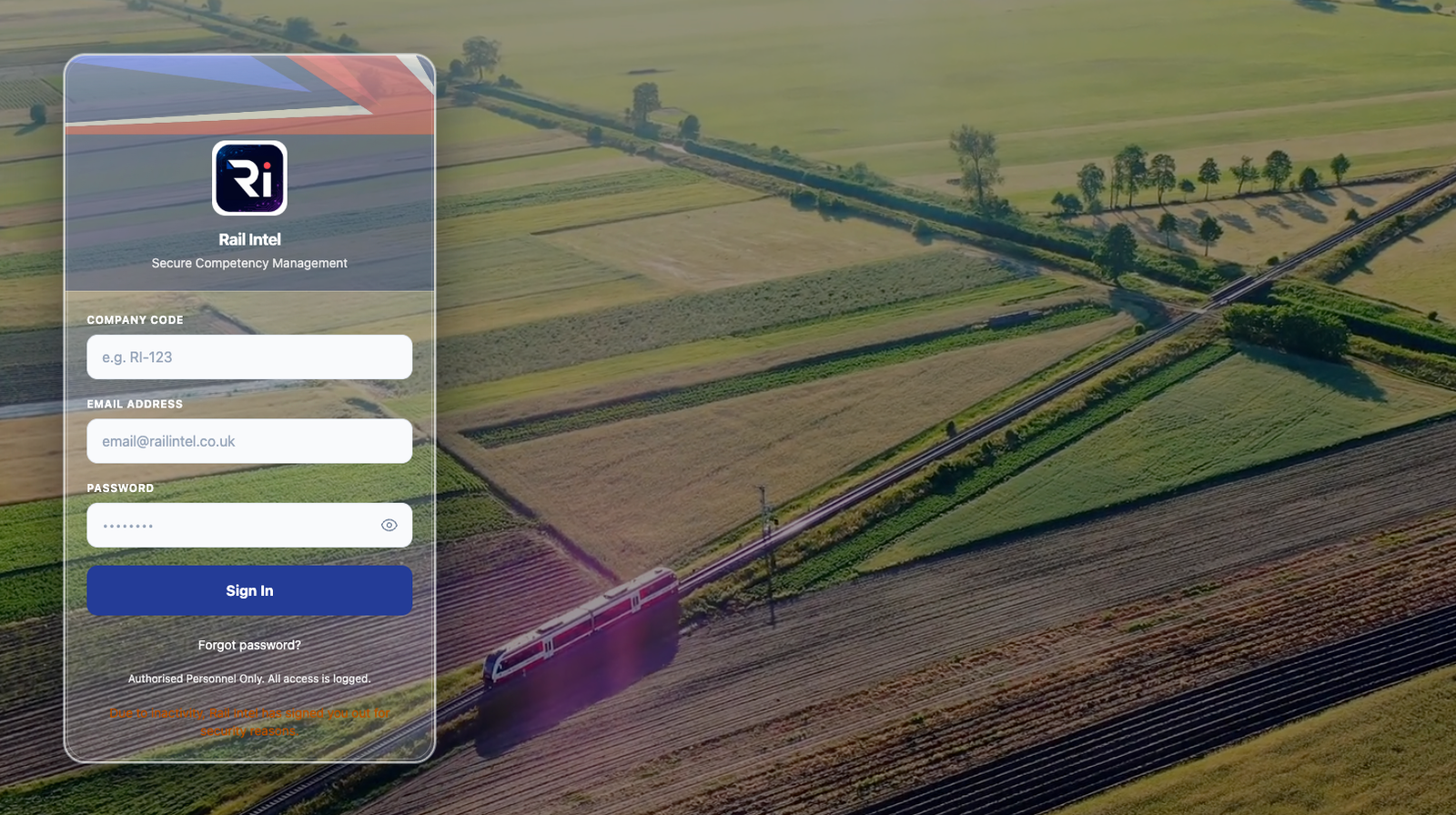 The Rail Intel sign-in screen, over the animated aerial railway backdrop used by the live app